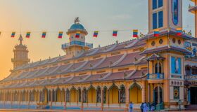 Cao Dai Temple’s vibrant architecture during a guided Cao Dai Tours experience with Legend Travel Group in Tay Ninh.